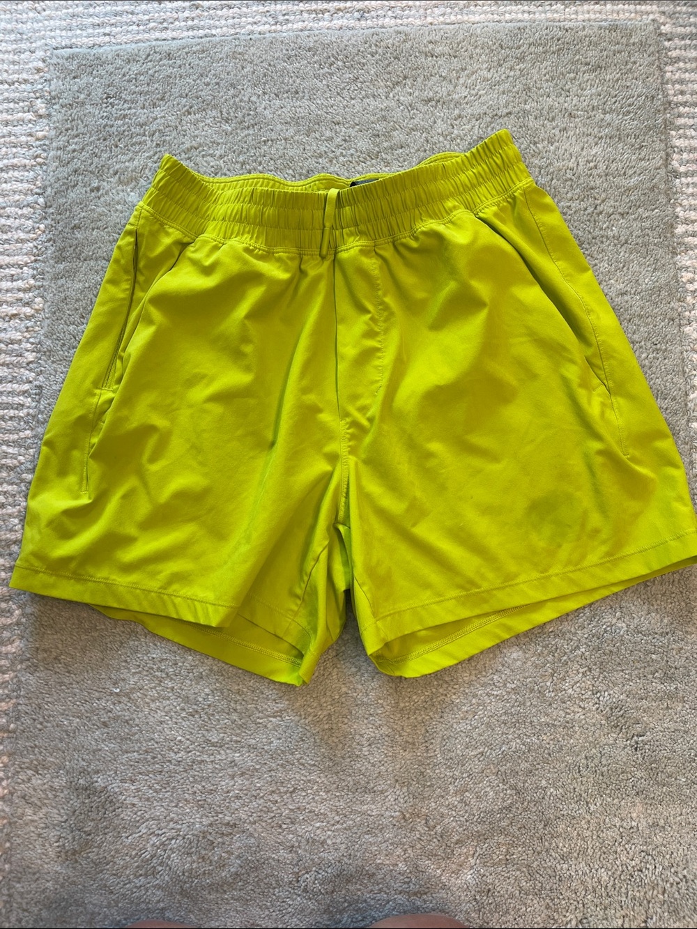 Lululemon men’s athletic Neon Lime shorts. Size Small